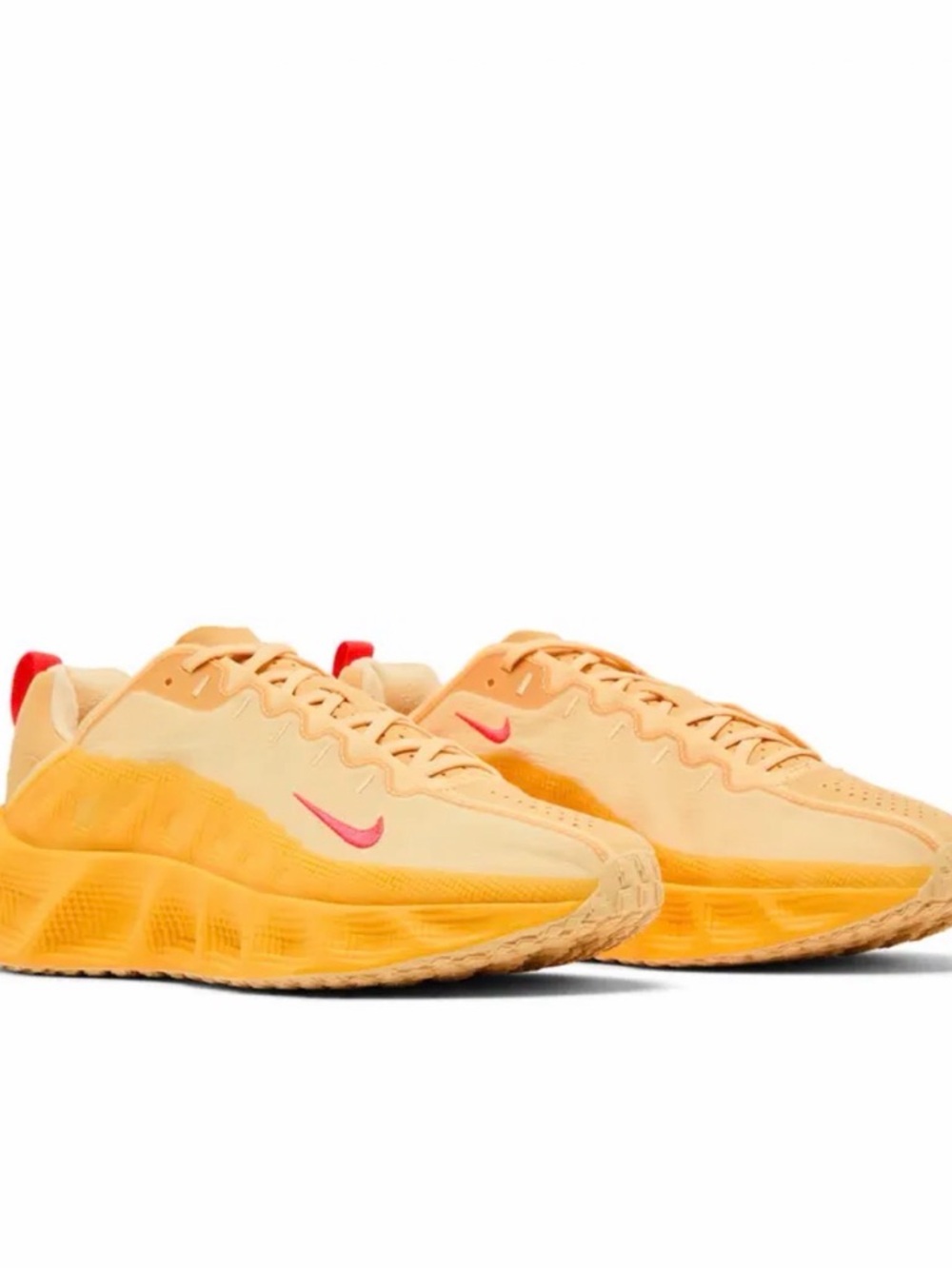 Nike Peach and Orange Low-Top Sneakers with Pink Swoosh